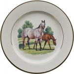 Bluegrass Dessert Plate Bluegrass is at once modern and classic. On a pure white porcelain body, Wear presents exquisite images of blue-blooded Thoroughbreds in scenes as lovely as her famous portraits. The graceful renderings are encircled in hand-painted burnished gold bands. Cup handles are finished with hand-painted burnished gold, bringing a polished and quiet elegance to the table.

Please call store for delivery timing.